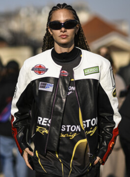 Os principais casacos e jaquetas do próximo inverno Mulher veste jaqueta motorcycle de couro preto e branco com detalhes de patches